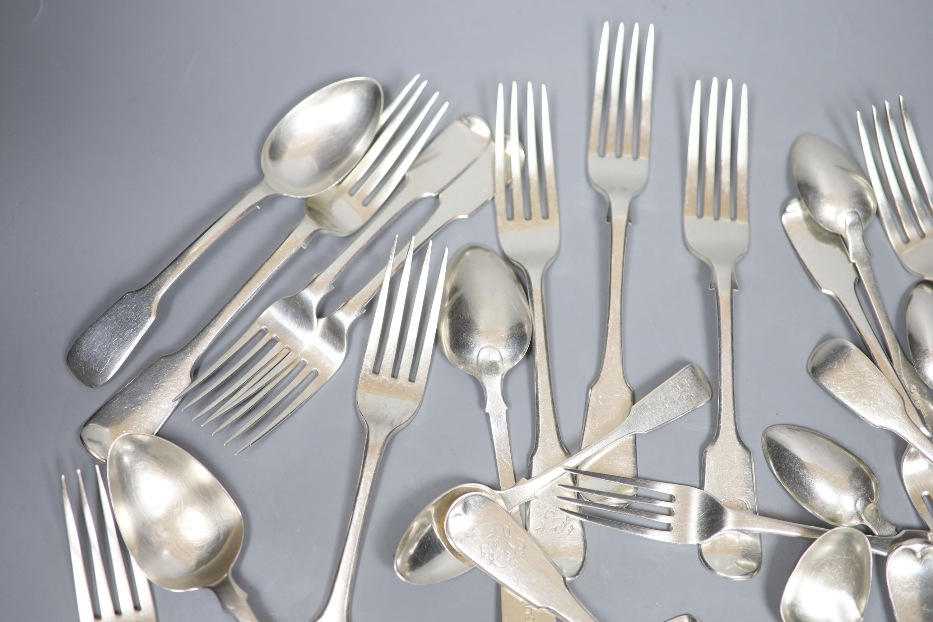 A matched part service of Old English pattern silver flatware, Georgian and later, some initialled, approx 55oz